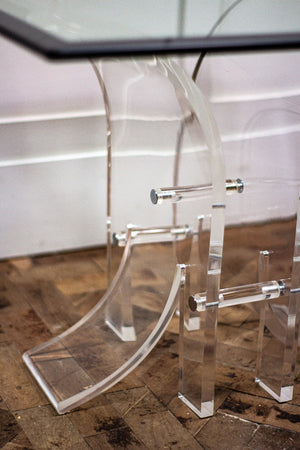 A 1980s Hollywood Regency Clear Lucite and Glass Side Table.