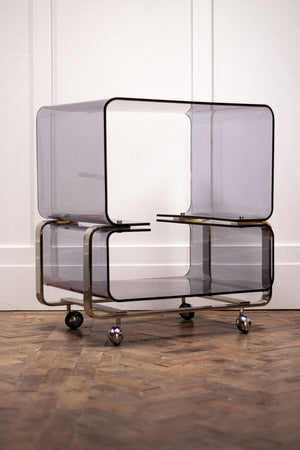 A 1960s Lucite and Chrome Unit.